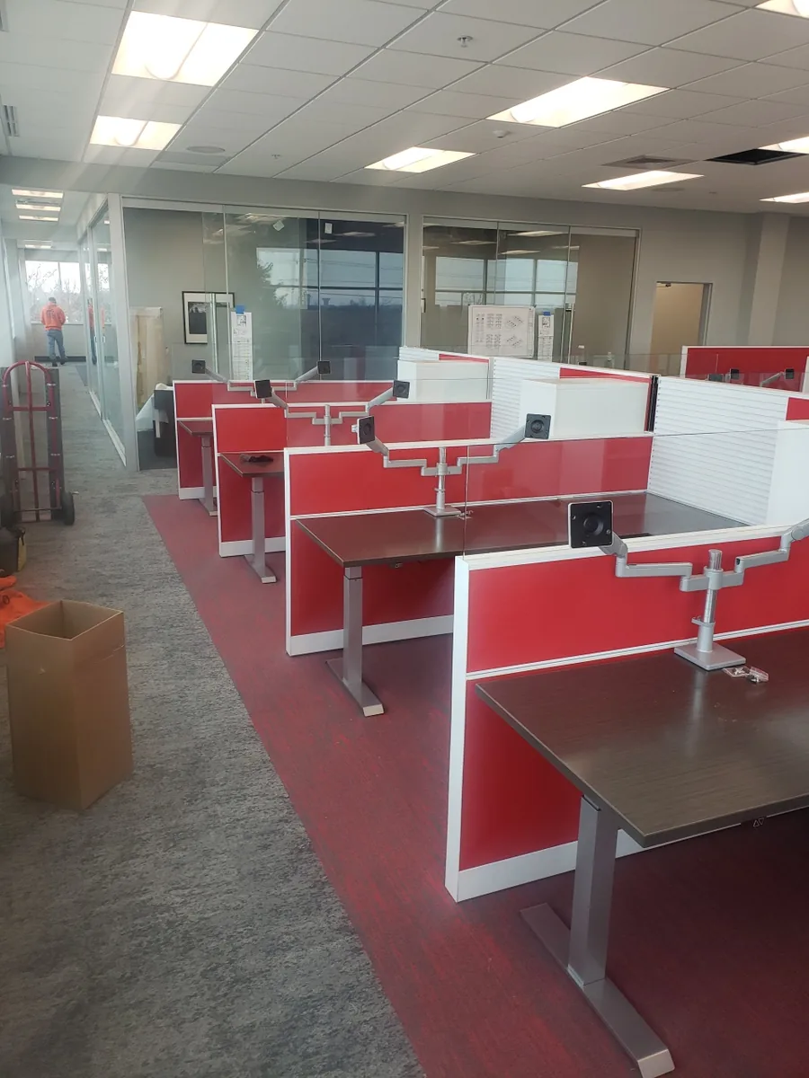 Rows of office workstations set in place after a move